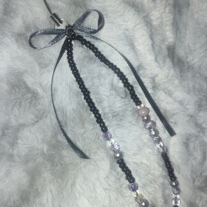 Elegant Beaded Necklace with Black and Purple Accents